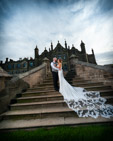 wedding couple on the steps at Allerton Castle Harrogate